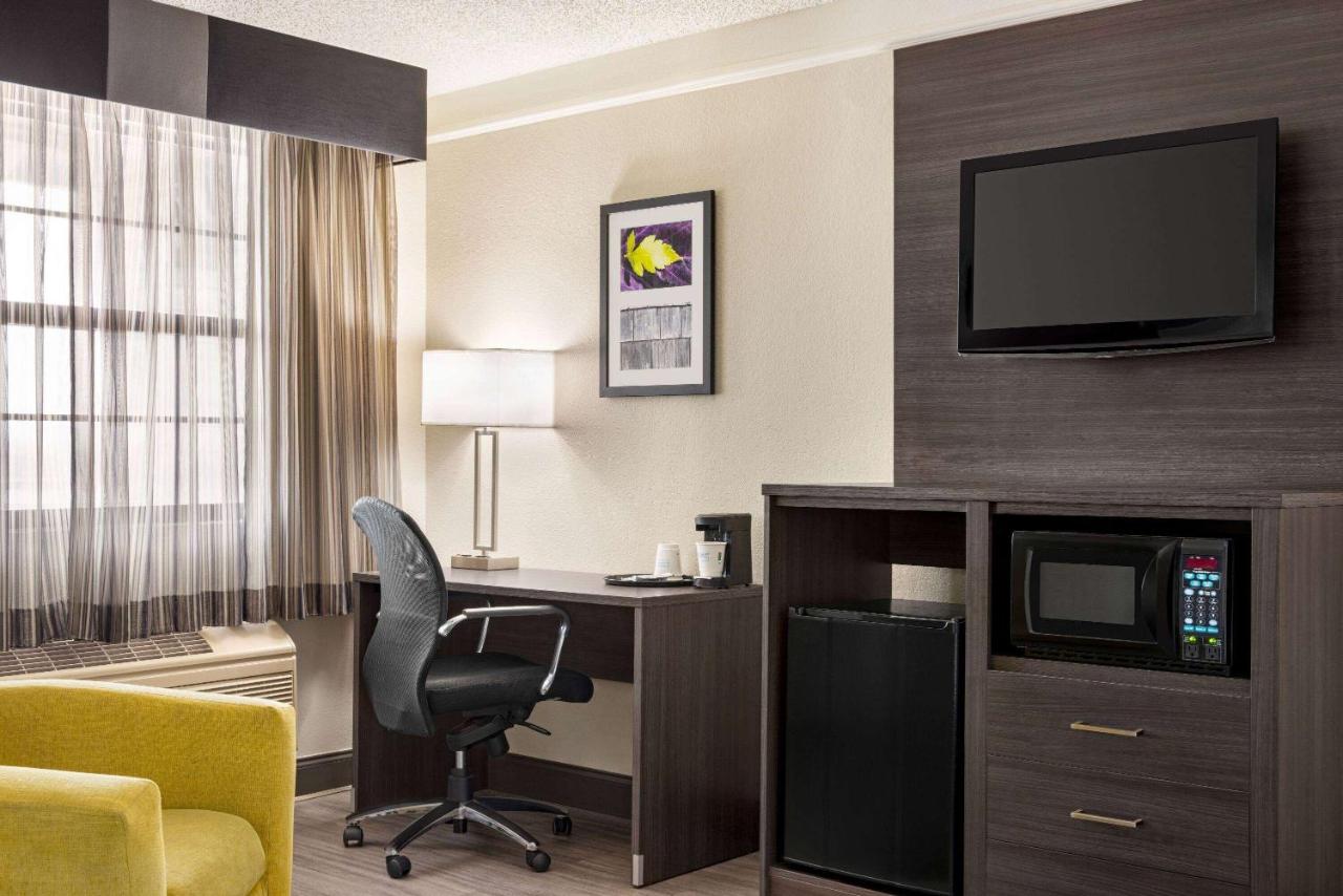 Family Suite with One King and Two Double Beds at La Quinta Inn by Wyndham San Antonio I-35 N at Toepperwein