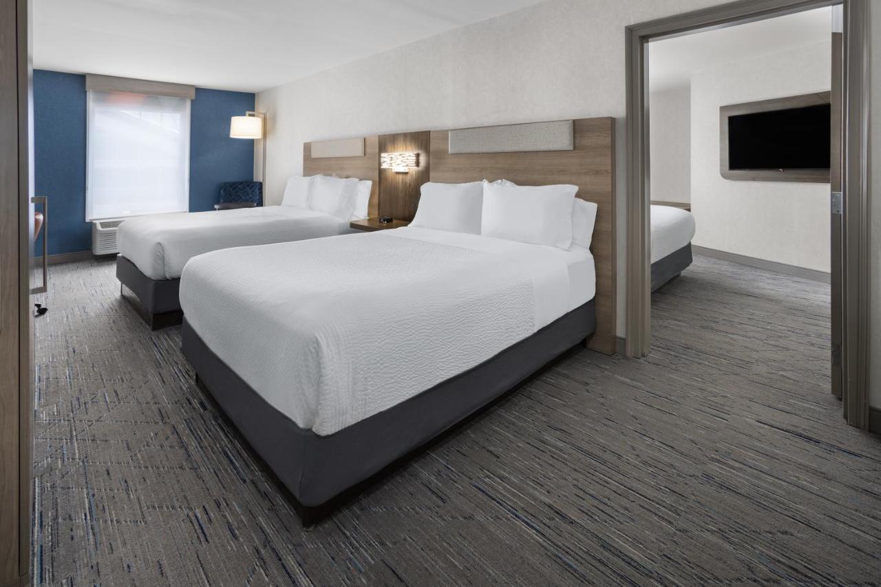 Suite with Three Queen Beds and Sofa Bed at Holiday Inn Express Hotel & Suites Brattleboro by IHG