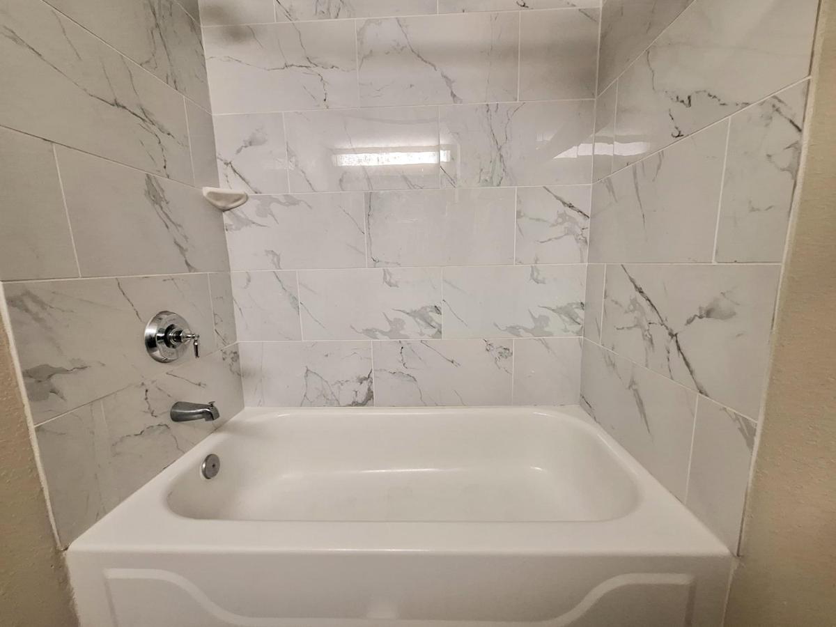 Queen Room with Two Queen Beds at Trident Inn & Suites, New Orleans