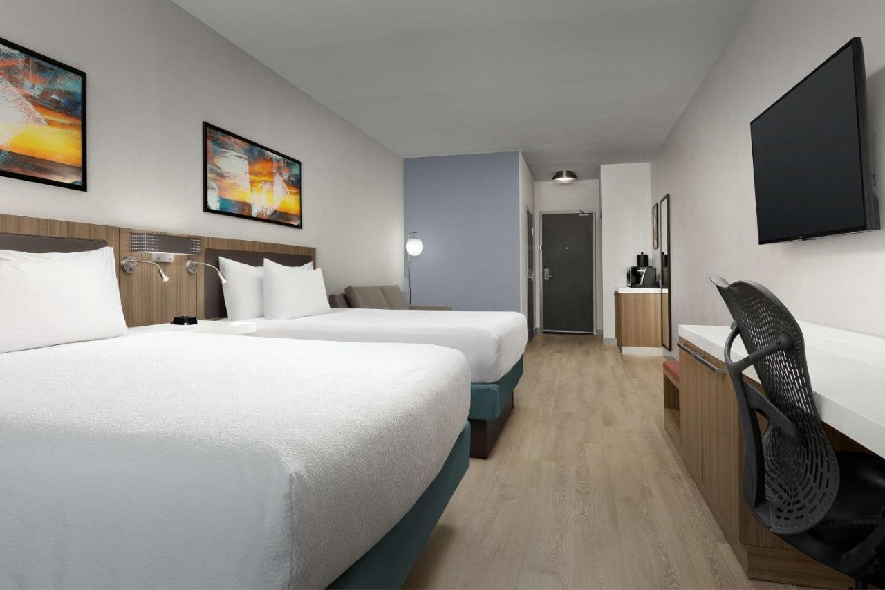 Queen Room with Two Queen Beds and Sofa Bed at Hilton Garden Inn Abilene