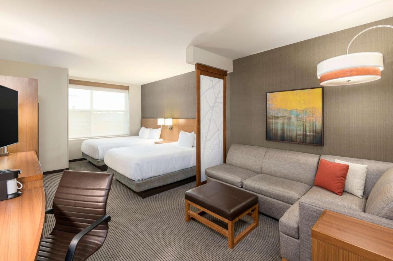 Queen Room with Two Queen Beds with Sofa Bed - Bathtub/Disability Access at Hyatt Place Greenville Downtown