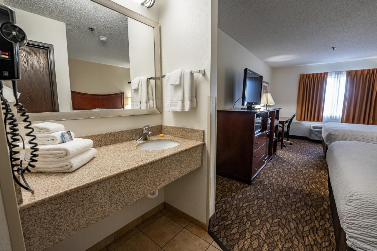 Queen Room with Two Queen Beds - Non-Smoking at Christopher Inn and Suites