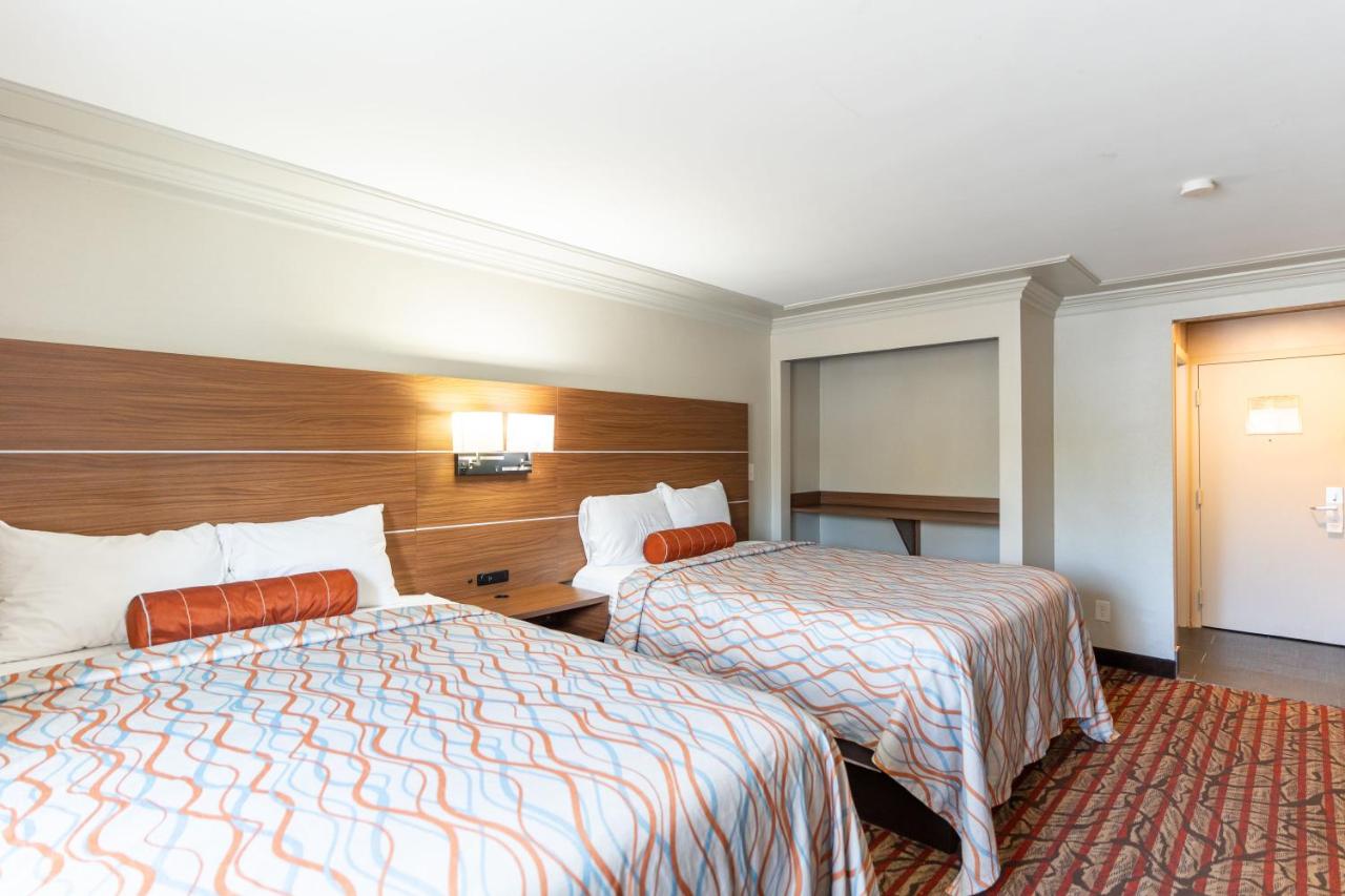 Queen Room with Two Queen Beds - Non-Smoking at Kalika Hotel