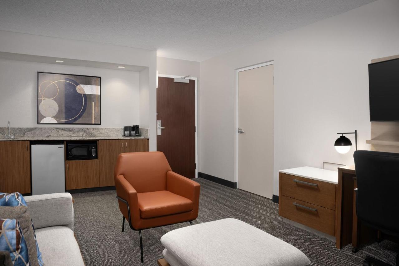 1 Bedroom Larger Suite, 1 King, Corner room, Balcony at Courtyard by Marriott Orlando East/UCF Area