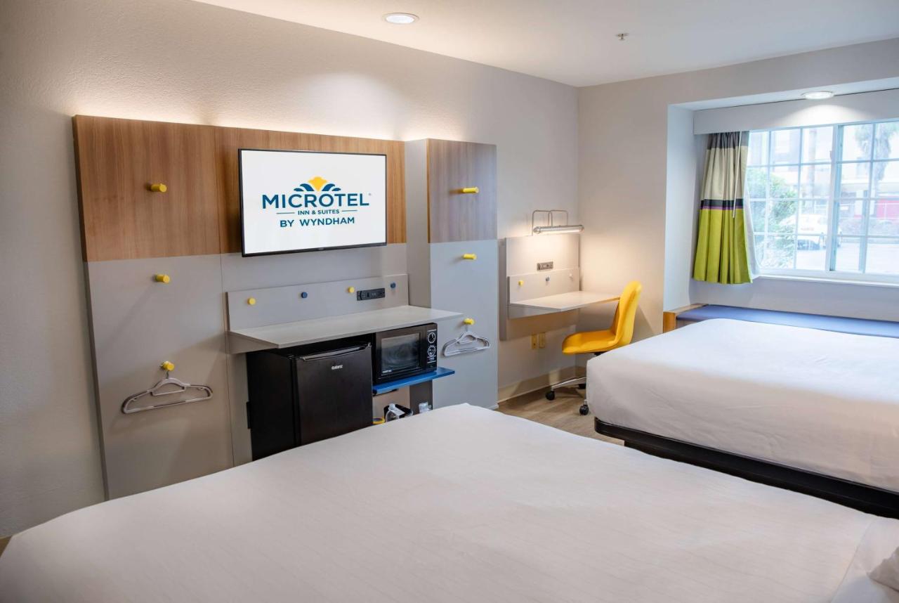 Deluxe Queen Room with Two Queen Beds at Microtel Inn & Suites by Wyndham Kingsland Naval Base I-95