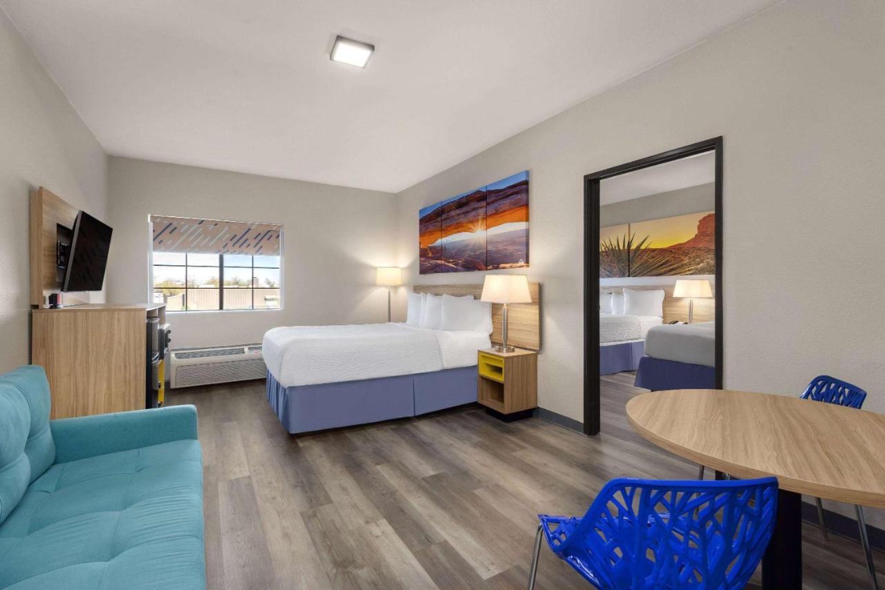 Suite One Bedroom with Three Queen Beds - Non-Smoking at Days Inn & Suites by Wyndham Tucson/Marana