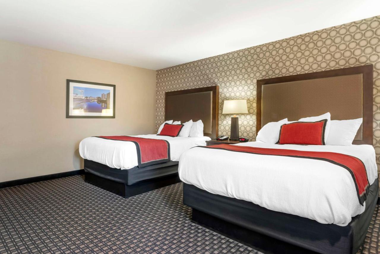 Bottom Floor Queen Room with Two Queen Beds - Pool Side at Best Western Plus Ramkota Hotel