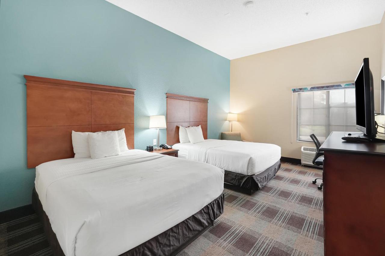 Queen Room with Two Queen Beds and Bath Tub - Mobility/Hearing Accessible - Non-Smoking at Red Lion Inn & Suites HOU Airport Road