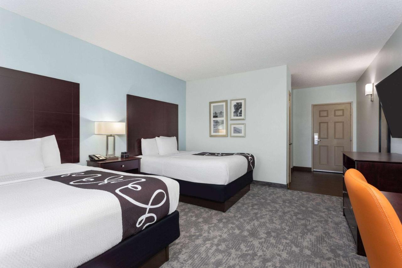 Queen Room with Two Queen Beds and Lake View - Non-Smoking at La Quinta Inn & Suites by Wyndham Bonita Springs Naples N.
