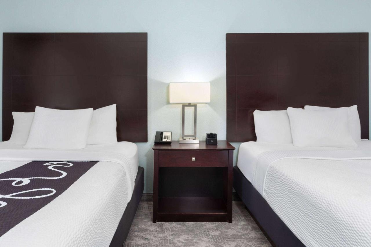 Queen Room with Two Queen Beds and Lake View - Non-Smoking at La Quinta Inn & Suites by Wyndham Bonita Springs Naples N.