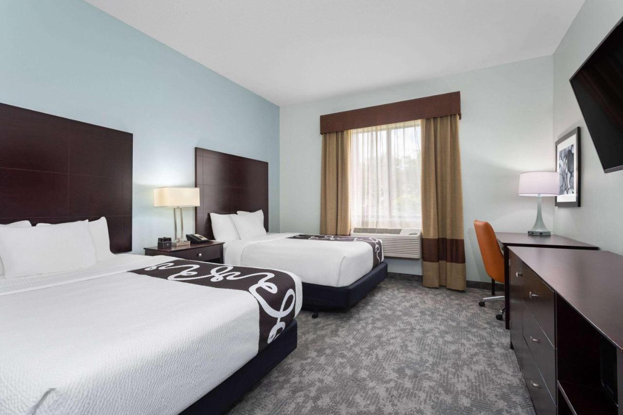 Queen Room with Two Queen Beds and Lake View - Non-Smoking at La Quinta Inn & Suites by Wyndham Bonita Springs Naples N.