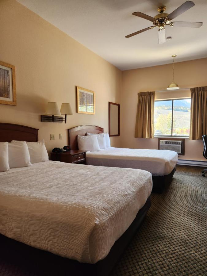 Standard Double Queen Room at Luxury Inn & Suites