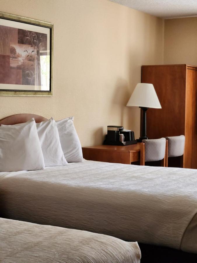 Standard Double Queen Room at Luxury Inn & Suites