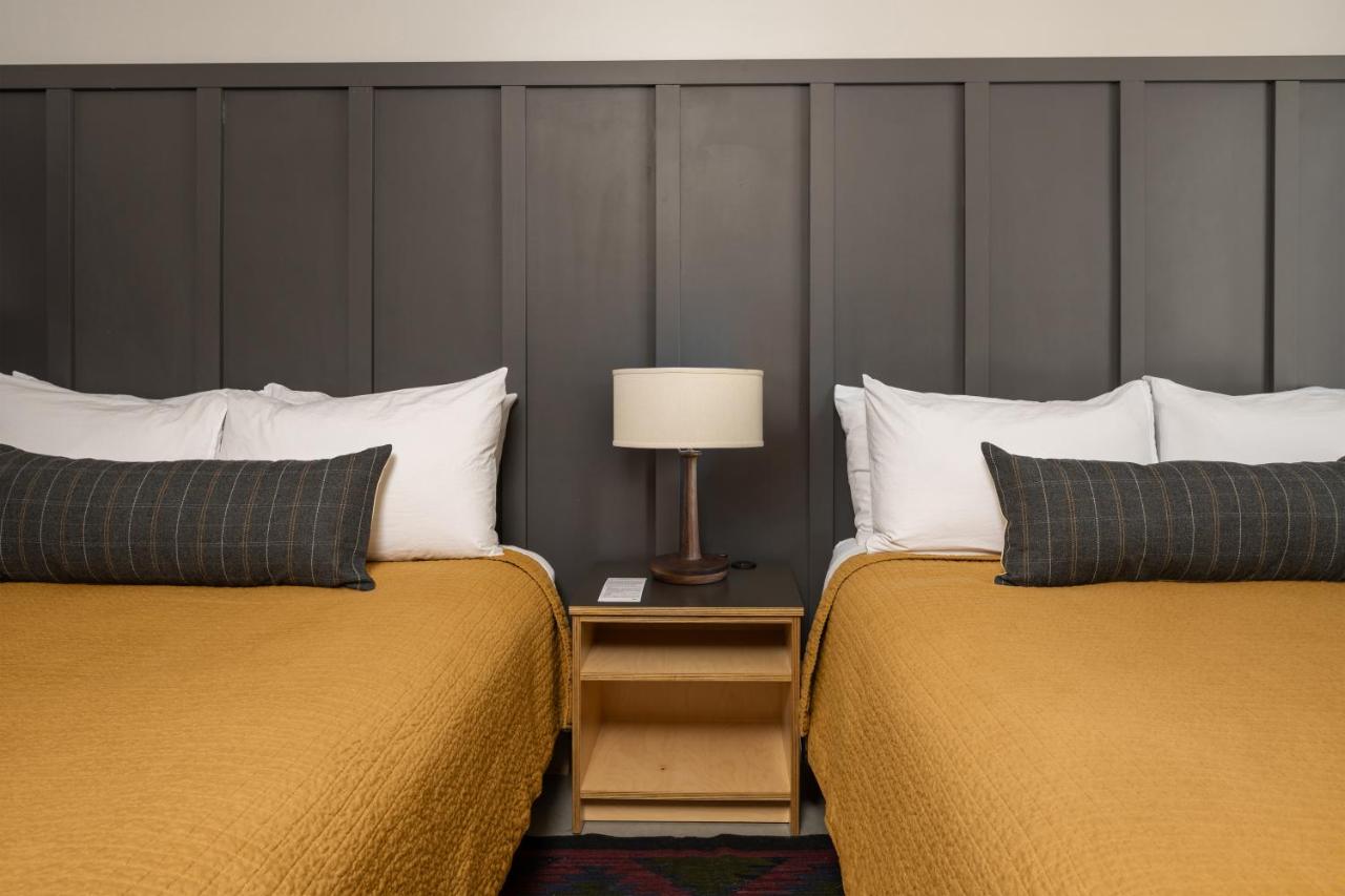 Queen Room with Two Queen Beds at The Coachman Hotel