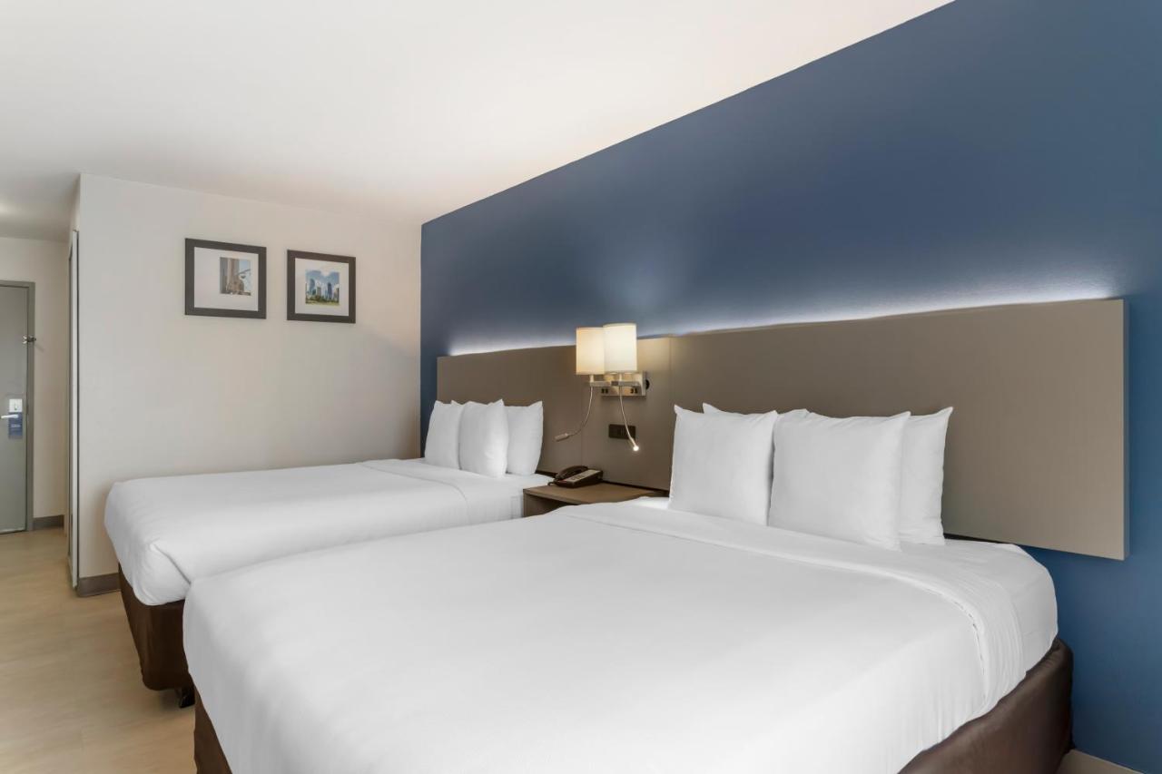 Queen Room with Two Queen Beds - Non-Smoking at Comfort Inn & Suites Houston FM1960 - Champions