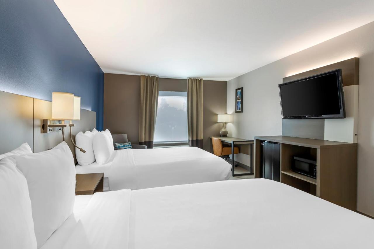 Queen Room with Two Queen Beds - Non-Smoking at Comfort Inn & Suites Houston FM1960 - Champions