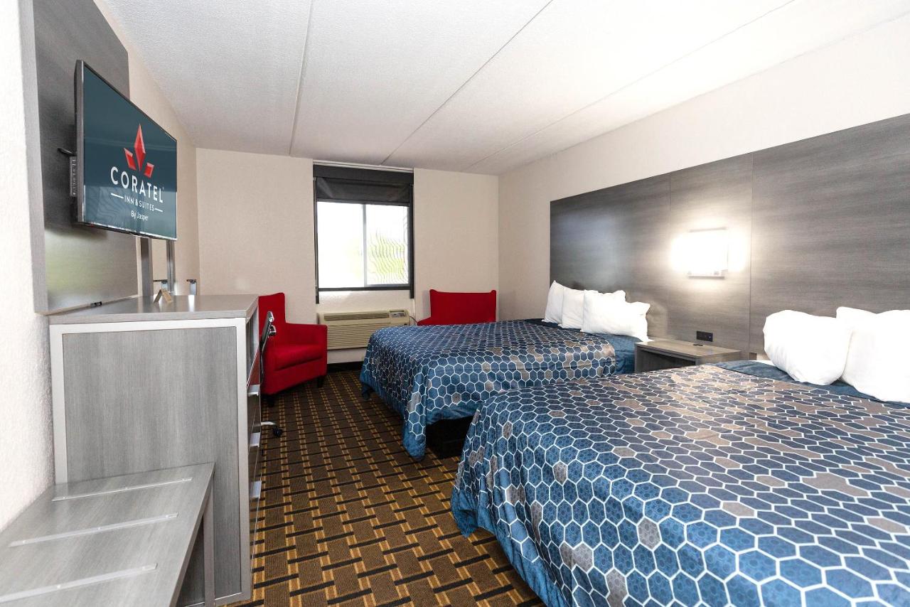 Deluxe Queen Room with Two Queen Beds at Coratel Inn & Suites by Jasper Mankato