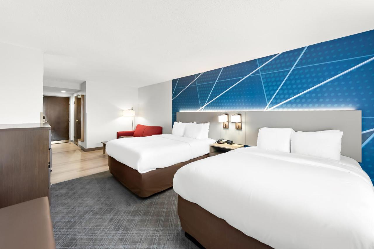 Queen Room with Two Queen Beds and Sofa Bed at Comfort Suites Columbus