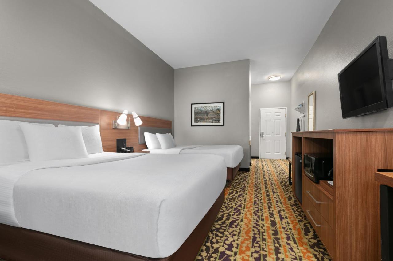 Queen Room with Two Queen Beds and Roll-In Shower - Mobility/Hearing Accessible - Non-Smoking at La Quinta Inn & Suites by Wyndham Belton - Temple South