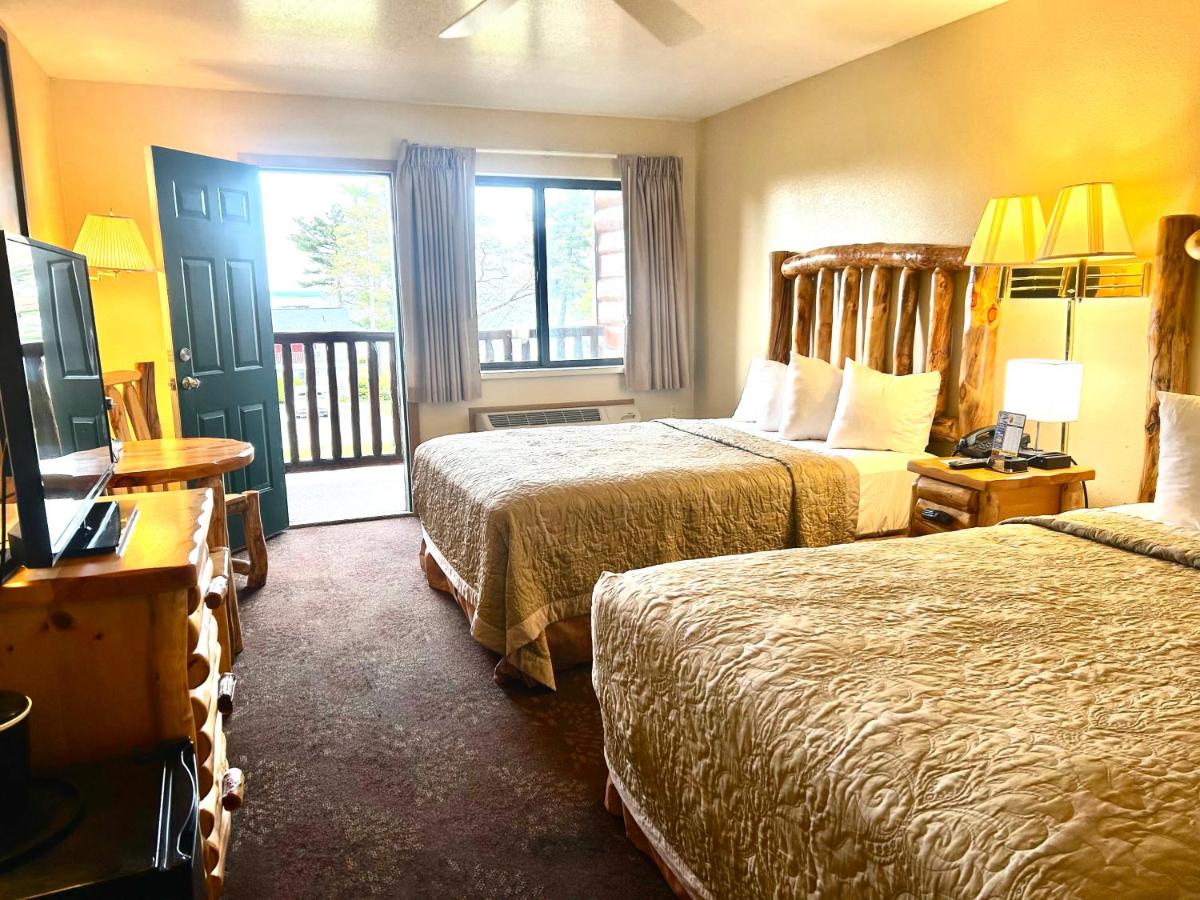 Queen Room with Two Queen Beds - Park and Lake View at Super 8 by Wyndham Bridgeview of Mackinaw City