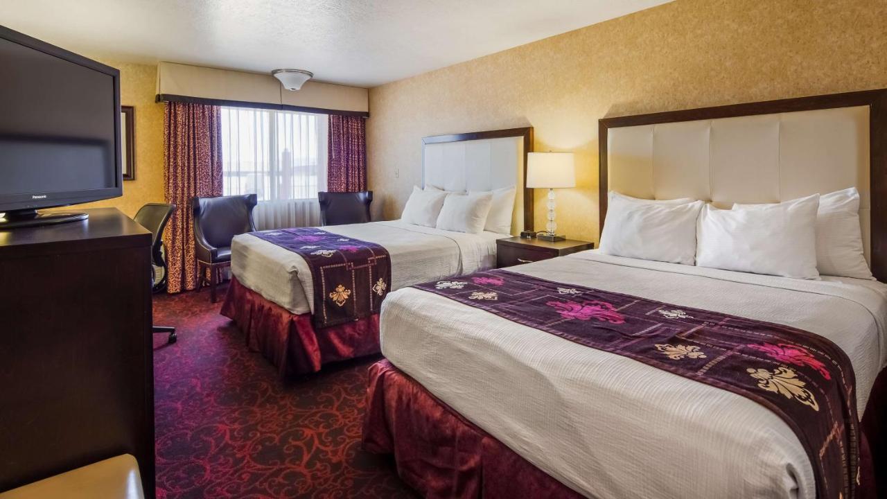 King Room with Two Queen Beds at Best Western Coral Hills