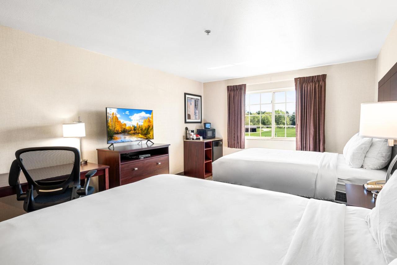 Queen Room with Two Queen Beds - Non-Smoking at Boarders Inn & Suites by Cobblestone Hotels - Shawano