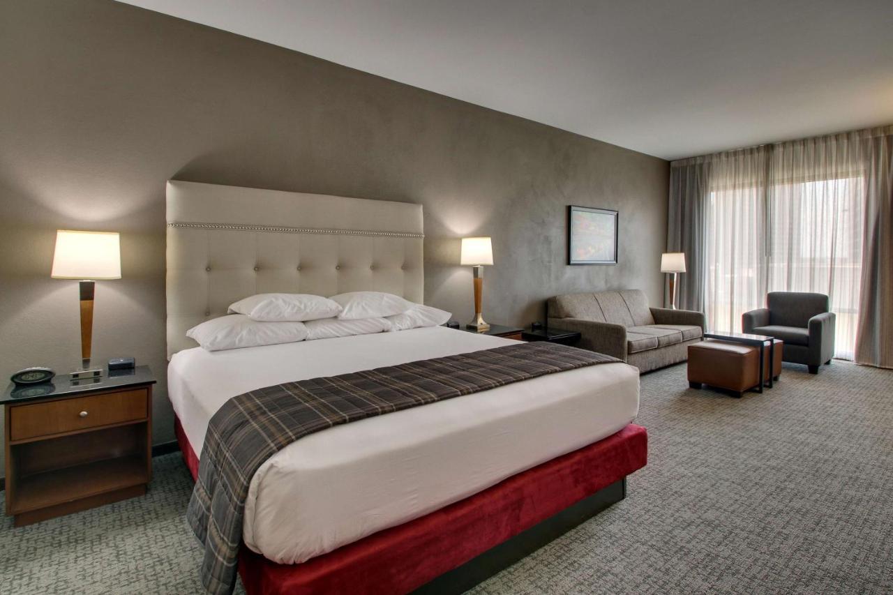 Deluxe King Room with Sofa Bed - Accessible, Roll-in Shower at Drury Plaza Hotel San Antonio Riverwalk