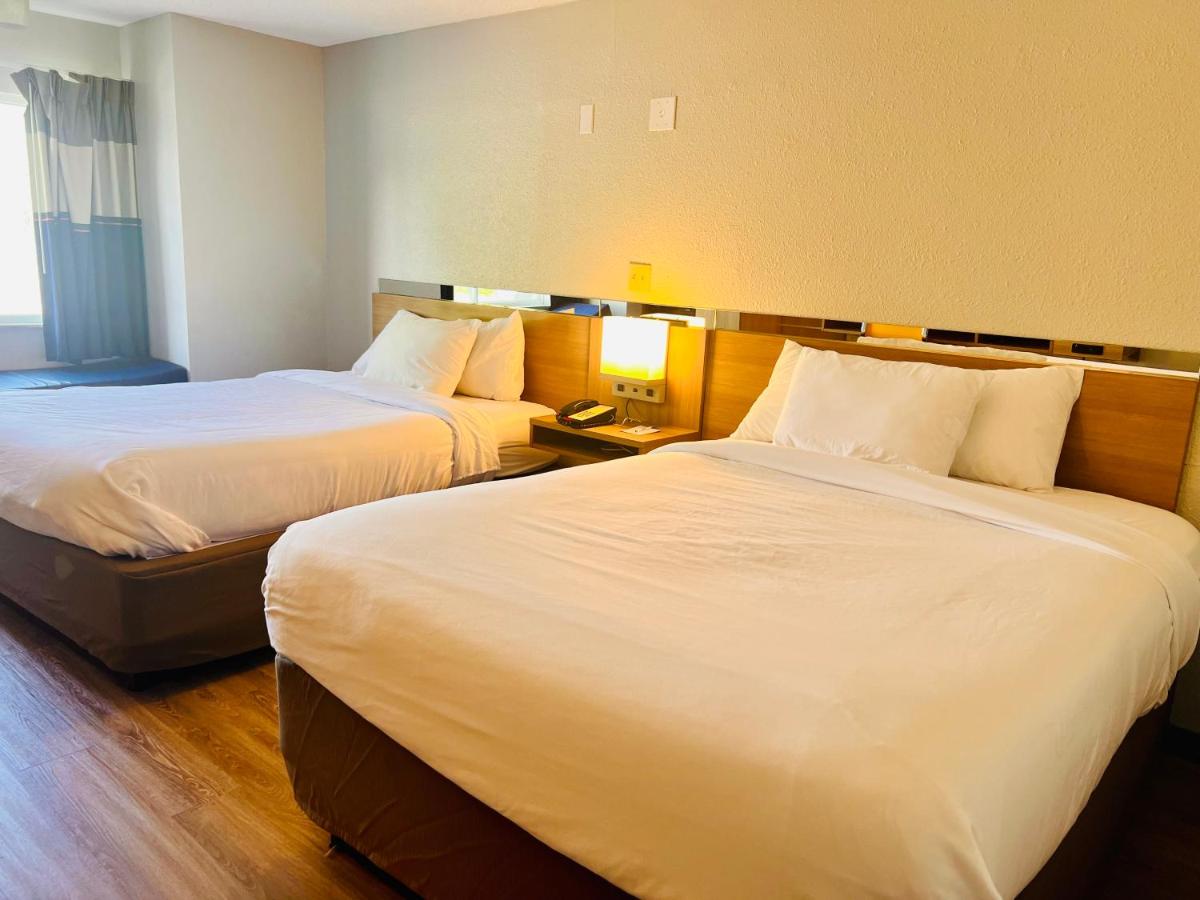 Queen Room with Two Queen Beds - Non-Smoking at Microtel Inn by Wyndham Lexington
