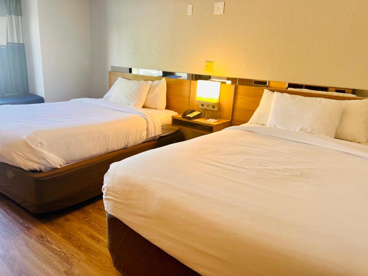 Queen Room with Two Queen Beds - Non-Smoking at Microtel Inn by Wyndham Lexington