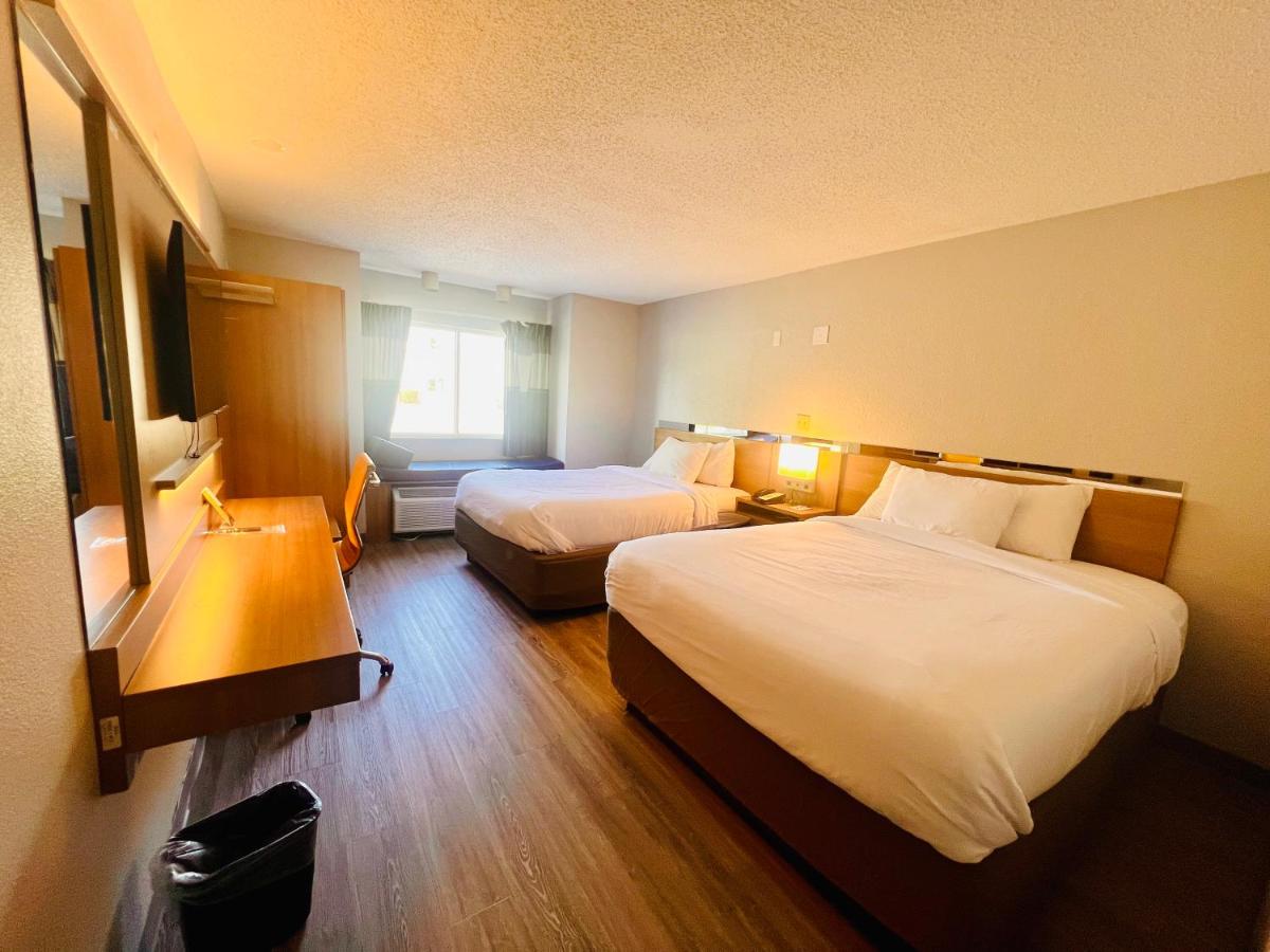 Queen Room with Two Queen Beds - Non-Smoking at Microtel Inn by Wyndham Lexington