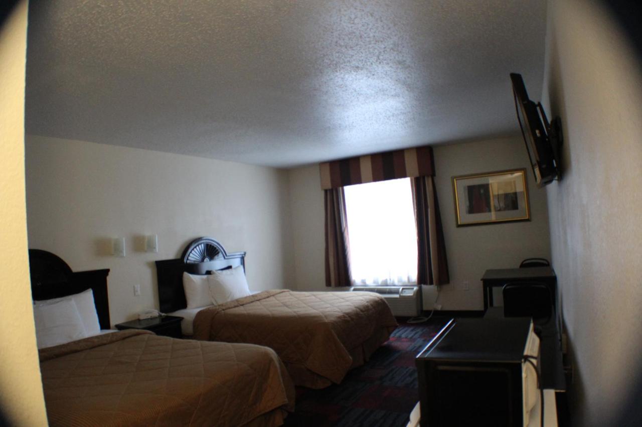 Queen Room with Two Queen Beds at Noble Suites