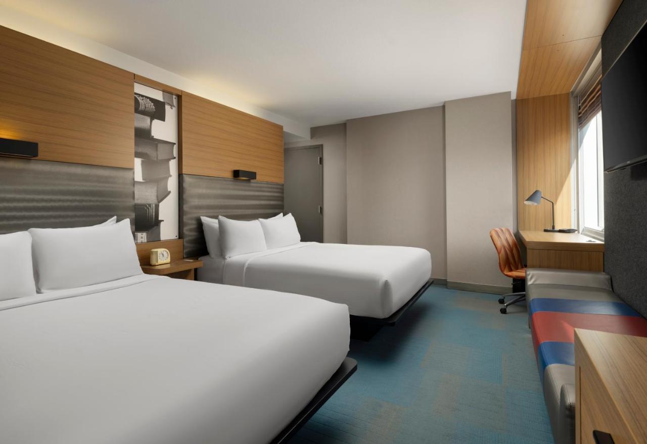 Traditional Queen Room with Two Queen Beds and Roll-in Shower - Mobility and Hearing Accessible at Aloft by Marriott Chicago Downtown River North