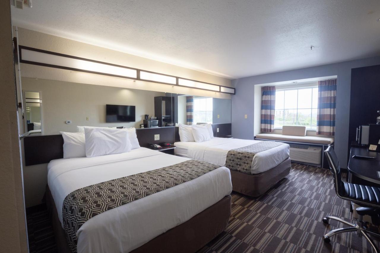 Queen Room with Two Queen Beds - Non-Smoking at Microtel Inn & Suites by Wyndham Waynesburg