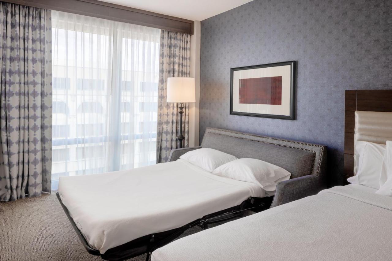 Deluxe Queen Room with Two Queen Beds with Sofa Bed at Hilton Garden Inn Washington DC/Georgetown Area