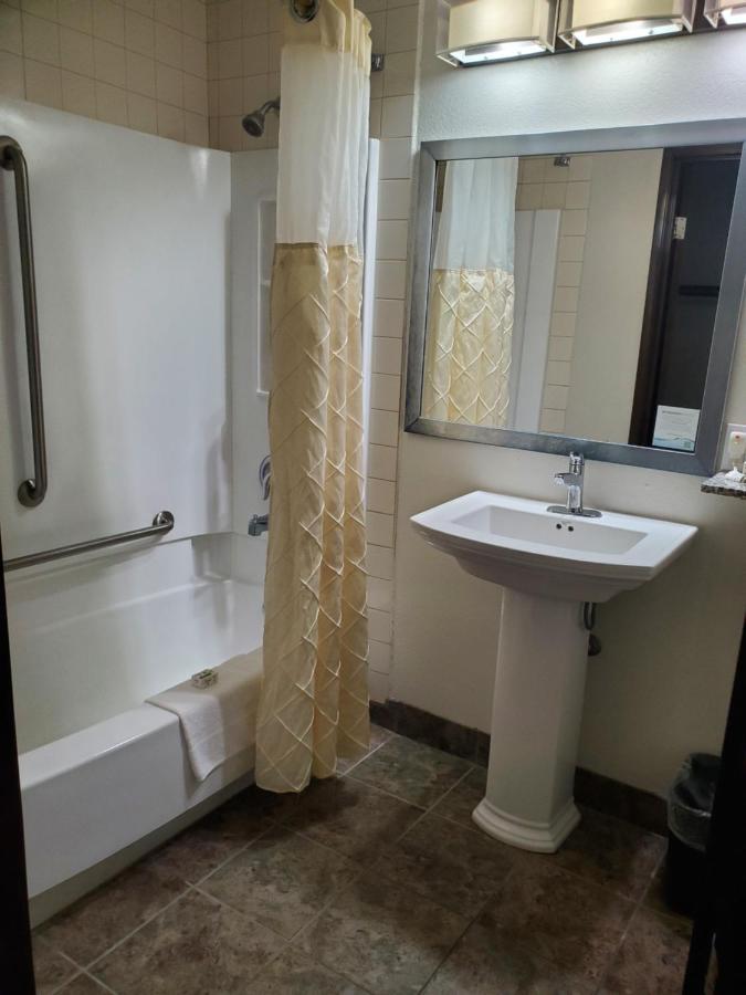 Queen Room with Two Queen Beds and Bath Tub - Mobility Access/Non-Smoking at AmericInn by Wyndham Delafield