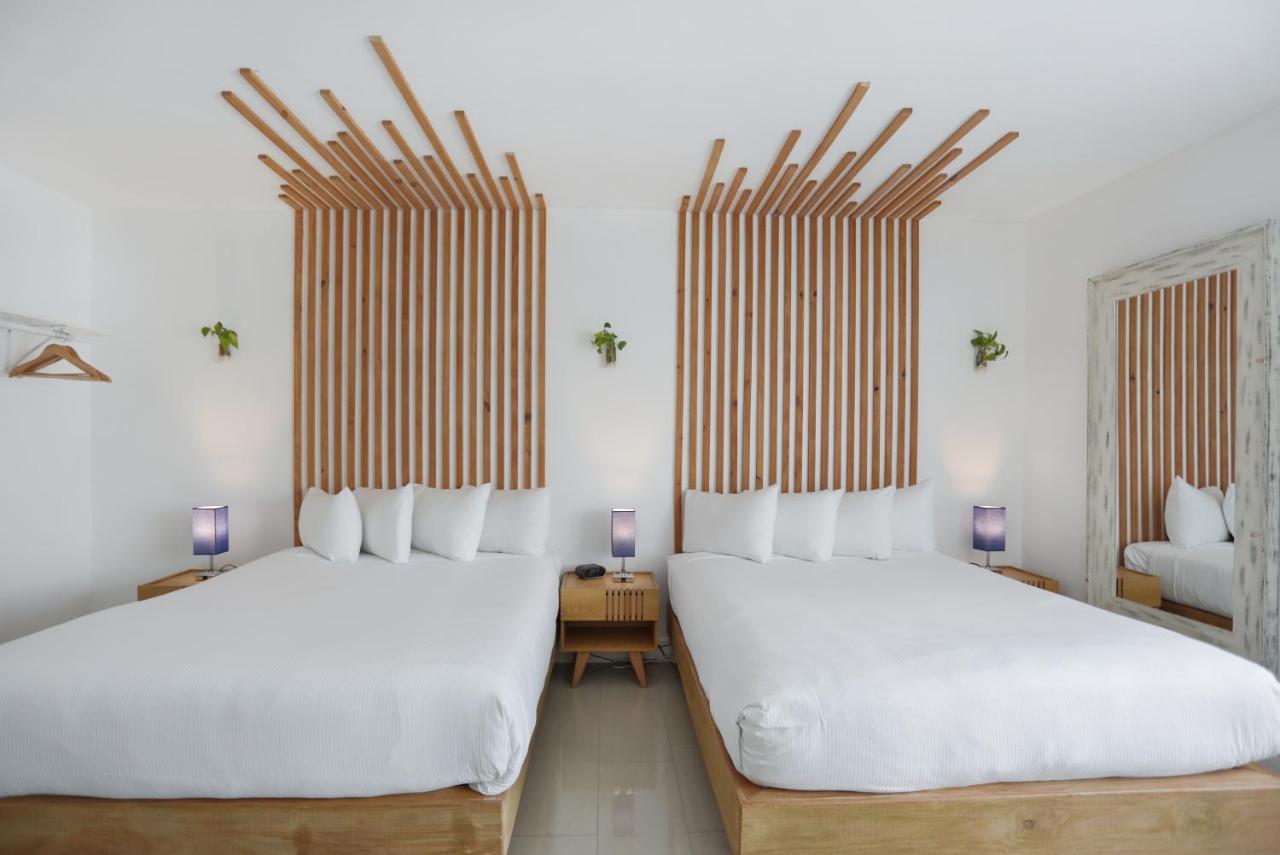 Premium Family One-Bedroom Suite with Kitchen at Hotel Belleza