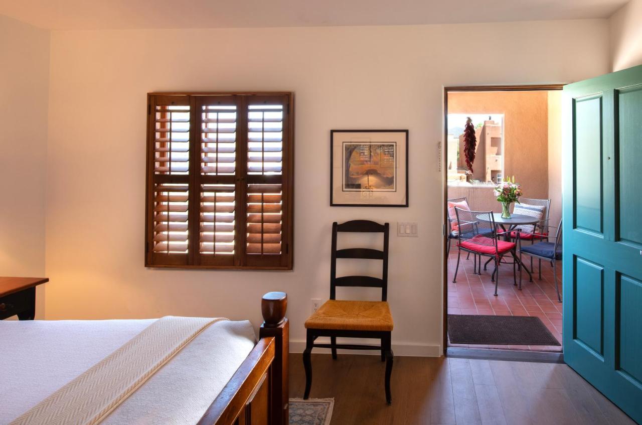 King Room with Fireplace at Piñon Court By La Fonda
