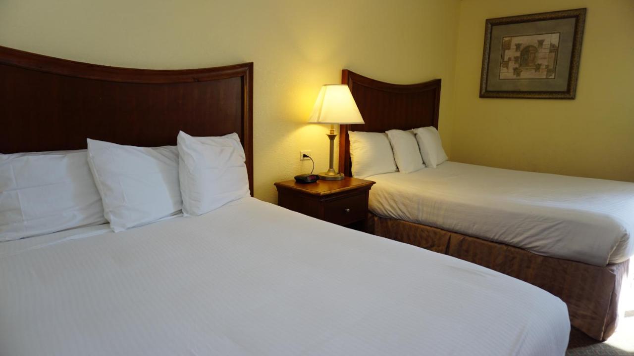 King Suite with Two Queen Beds - Non-Smoking at Baymont by Wyndham Arlington At Six Flags Dr