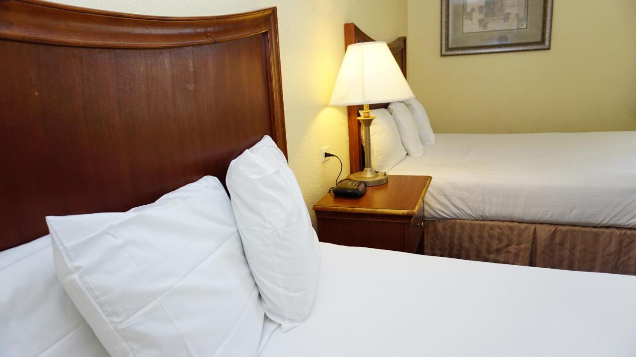 Queen Room with Two Queen Beds - Non-Smoking at Baymont by Wyndham Arlington At Six Flags Dr