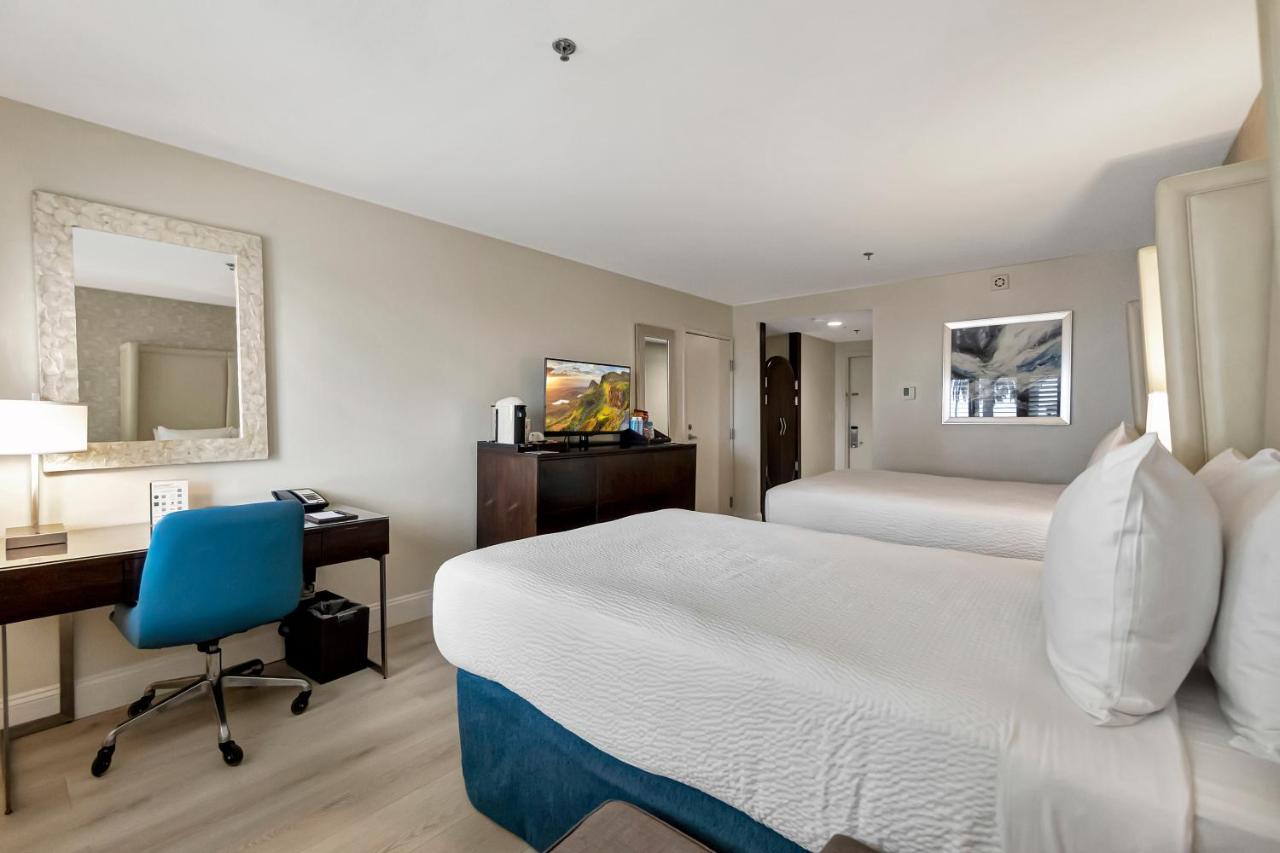 Standard Two Double Beds with Balcony at Ocean View Hotel