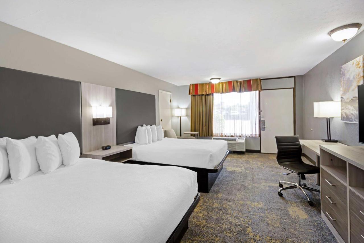 Queen Room with Two Queen Beds - Pool View at Best Western Plus Weston Inn