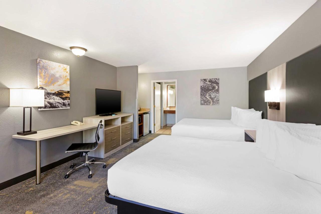 Queen Room with Two Queen Beds - Pool View at Best Western Plus Weston Inn