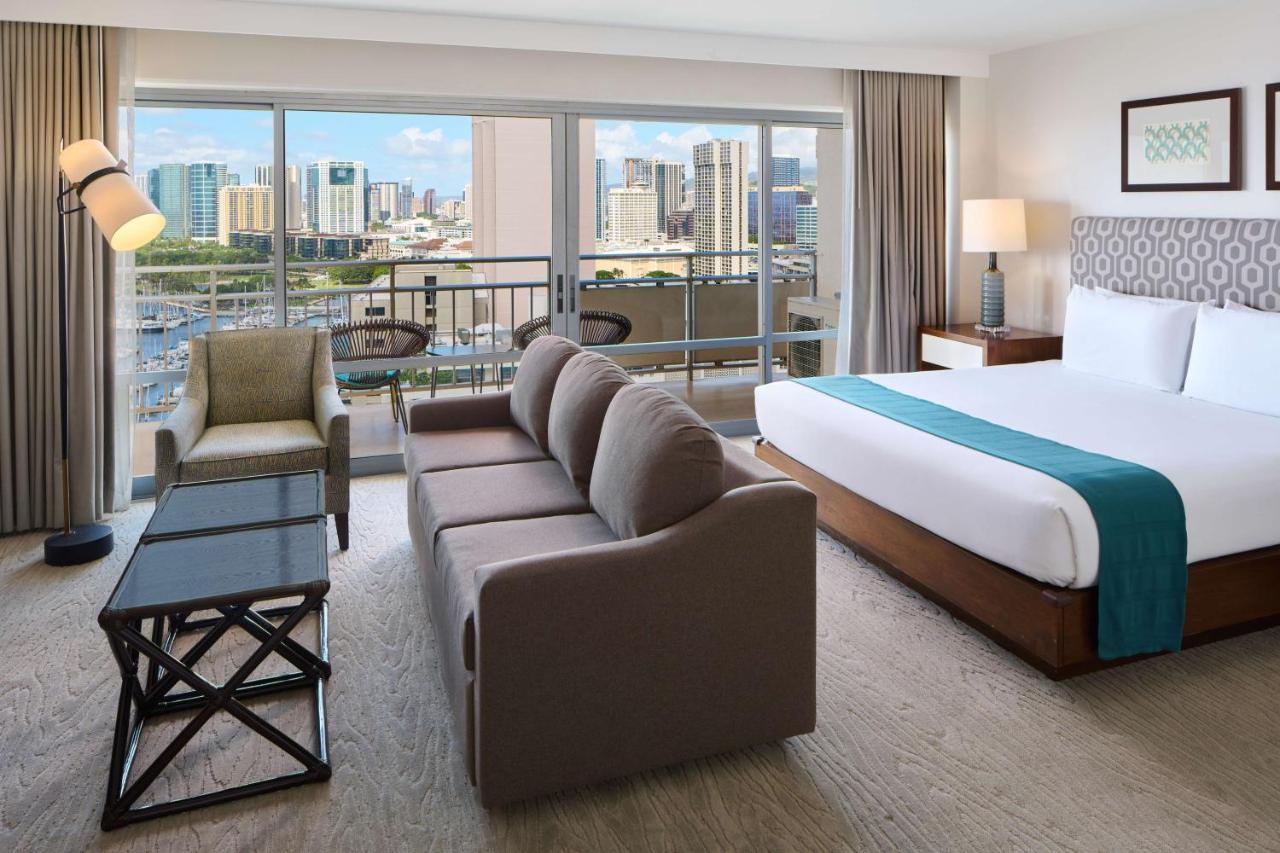 Luxury Sunset Junior Suite with Ocean View and Kitchen at Ilikai Hotel & Luxury Suites