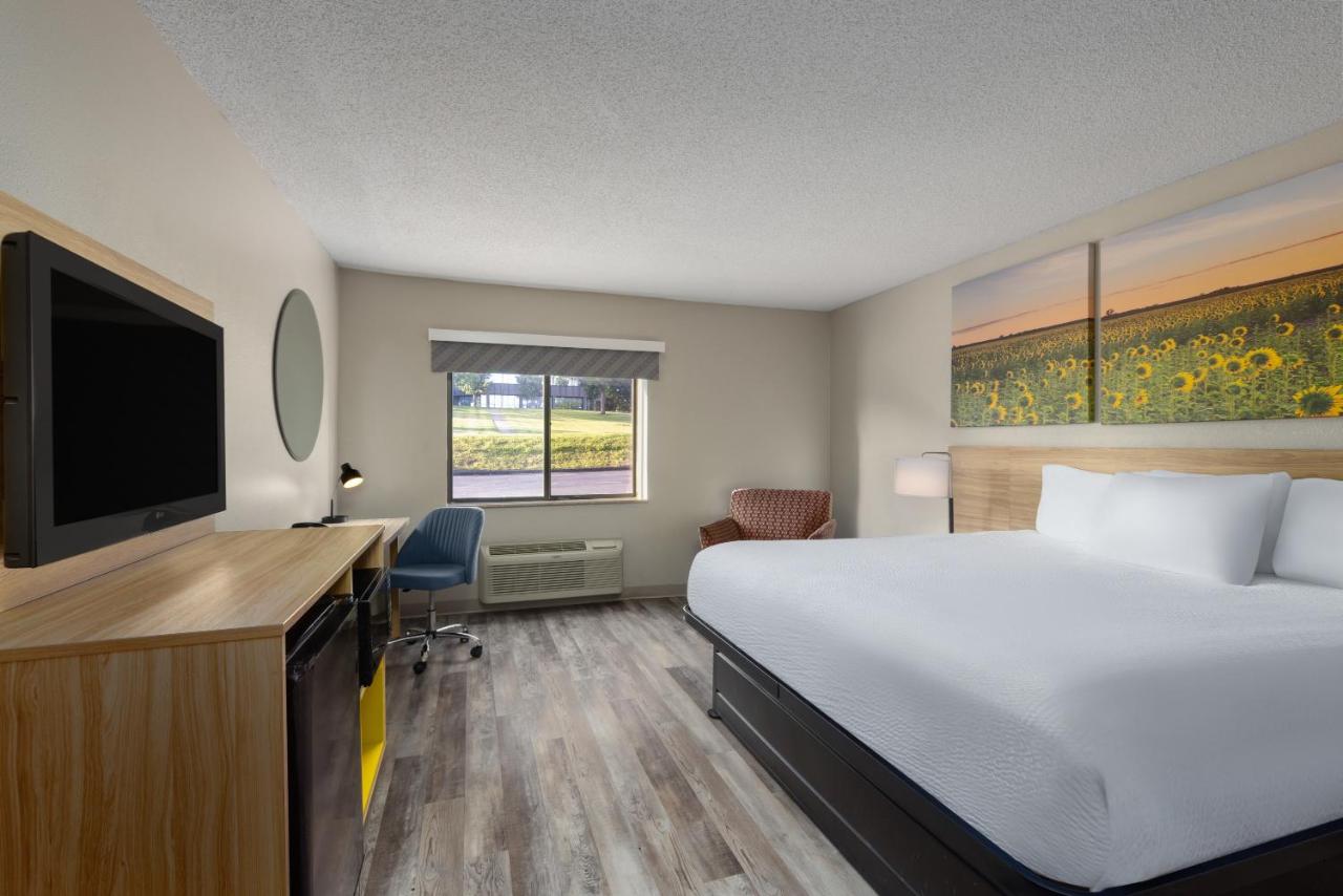 King Room - Smoking at Days Inn & Suites by Wyndham Kansas City South