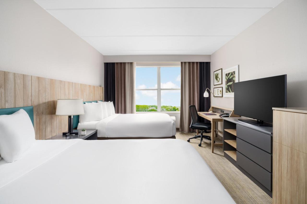 Queen Room with Two Queen Beds - Disability Access at Country Inn & Suites by Radisson, Orlando Airport, FL