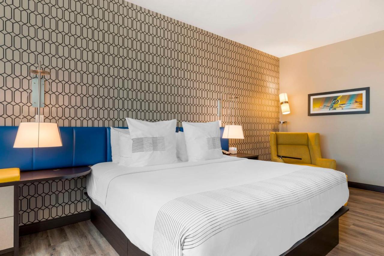King Room with Roll-In Shower - Disability Access at GLō Best Western Dallas South DeSoto