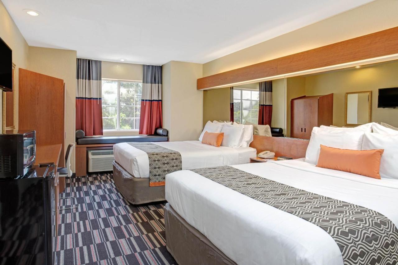 Queen Room with Two Queen Beds - Non-Smoking at Microtel Inn & Suites by Wyndham Bushnell
