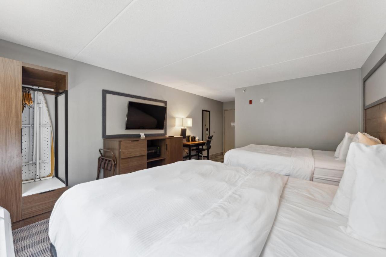 Queen Room with Two Queen Beds - Non-Smoking at AmericInn by Wyndham Wisconsin Dells