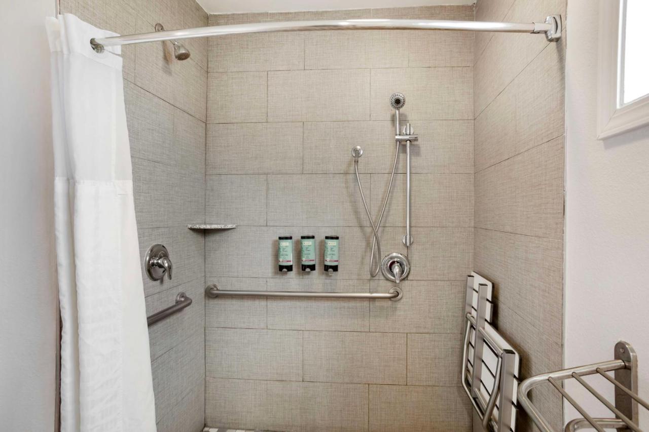 Queen Room with Two Queen Beds and Mobility Accessible Roll-In Shower at Best Western Inn