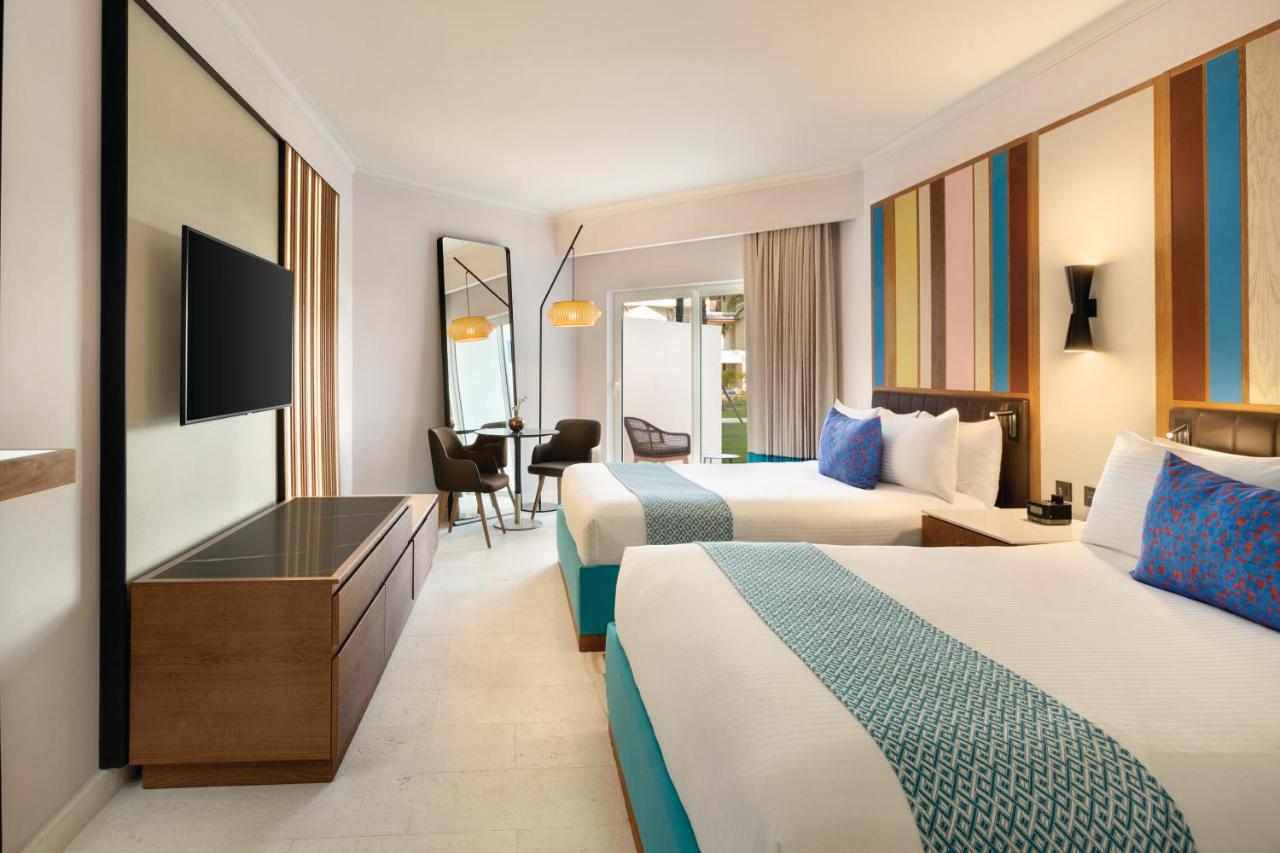 Deluxe Garden View Two Queens at Hilton La Romana, an All-Inclusive Family Resort
